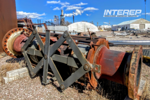 INTEREP inspection image showing a retired metal bellows expansion joint with external restraining hardware